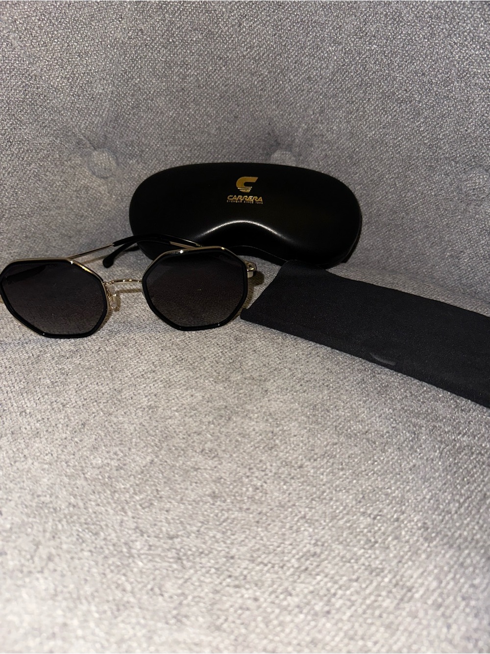 Carrera Sunglasses with Black Lenses and Gold Frame Accents